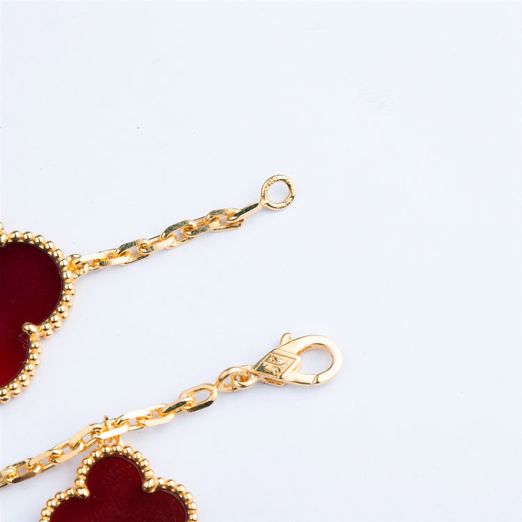 {
"Resenly Jewelry": "Resenly Jewelry",
"CLOVER BRACELET 5 MOTIFS CARNELIAN TIGER EYE": "クローバーブレスレット 5モチーフ カーネリアン・タイガーアイ"
}