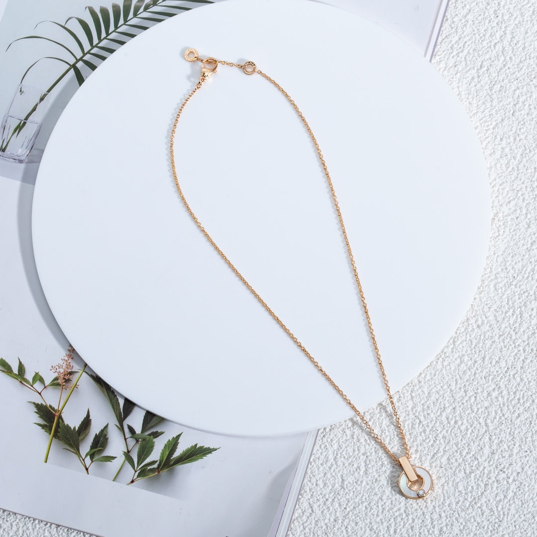 {
"Resenly Jewelry": "Resenly Jewelry",
"GARI NECKLACE PINK GOLD MOP": "GARI ネックレス ピンクゴールド MOP"
}