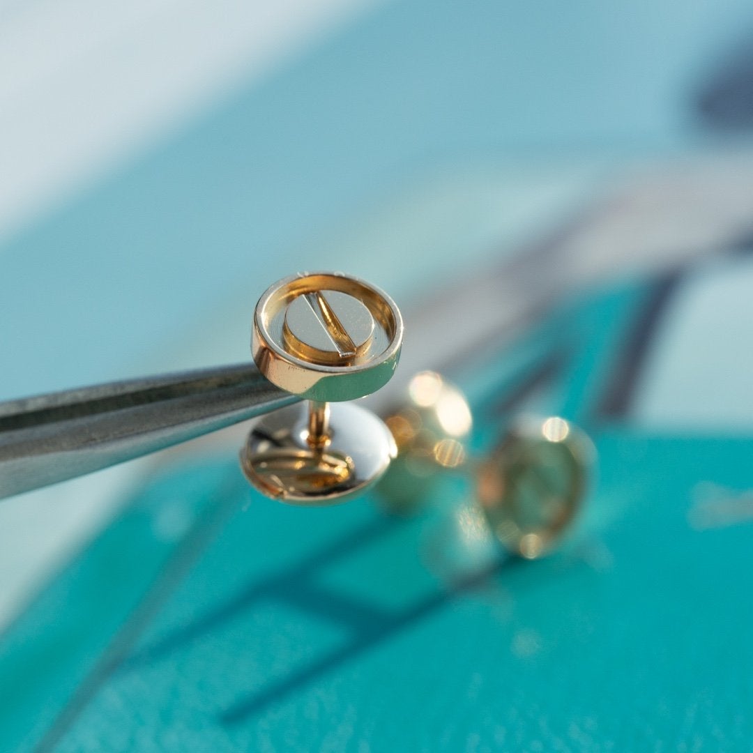 {
  "Resenly Jewelry": "レゼンリー・ジュエリー",
  "LOVE EARRINGS PINK GOLD 10MM": "LOVE イヤリング ピンクゴールド 10MM"
}