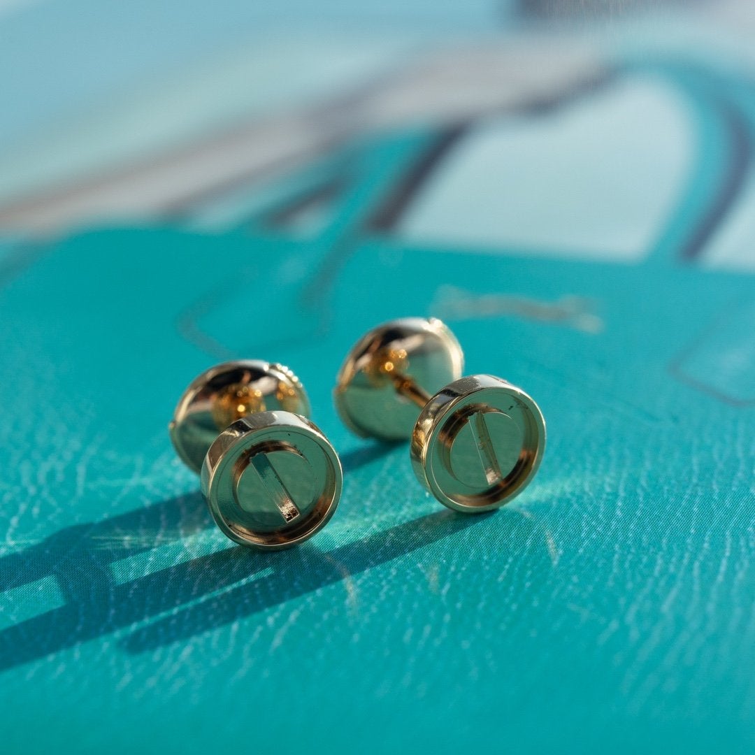 {
  "Resenly Jewelry": "レゼンリー・ジュエリー",
  "LOVE EARRINGS PINK GOLD 10MM": "LOVE イヤリング ピンクゴールド 10MM"
}
