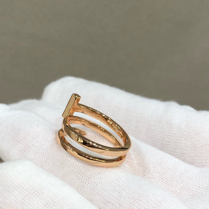 {
  "Resenly Jewelry": "レゼンリー・ジュエリー",
  "T WIRE DOUBLE ROWS RING PINK GOLD": "Tワイヤー ダブルロウ リング ピンクゴールド"
}