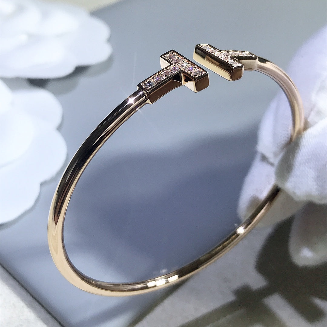 {
  "Resenly Jewelry": "Resenly Jewelry",
  "T BRACELET PINK GOLD 1.8MM DIAMOND": "Tブレスレット ピンクゴールド 1.8MM ダイヤモンド"
}