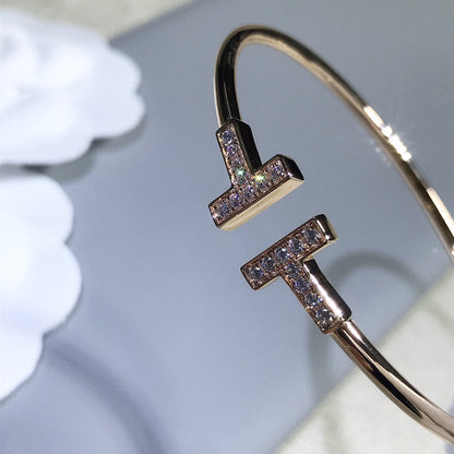 {
  "Resenly Jewelry": "Resenly Jewelry",
  "T BRACELET PINK GOLD 1.8MM DIAMOND": "Tブレスレット ピンクゴールド 1.8MM ダイヤモンド"
}