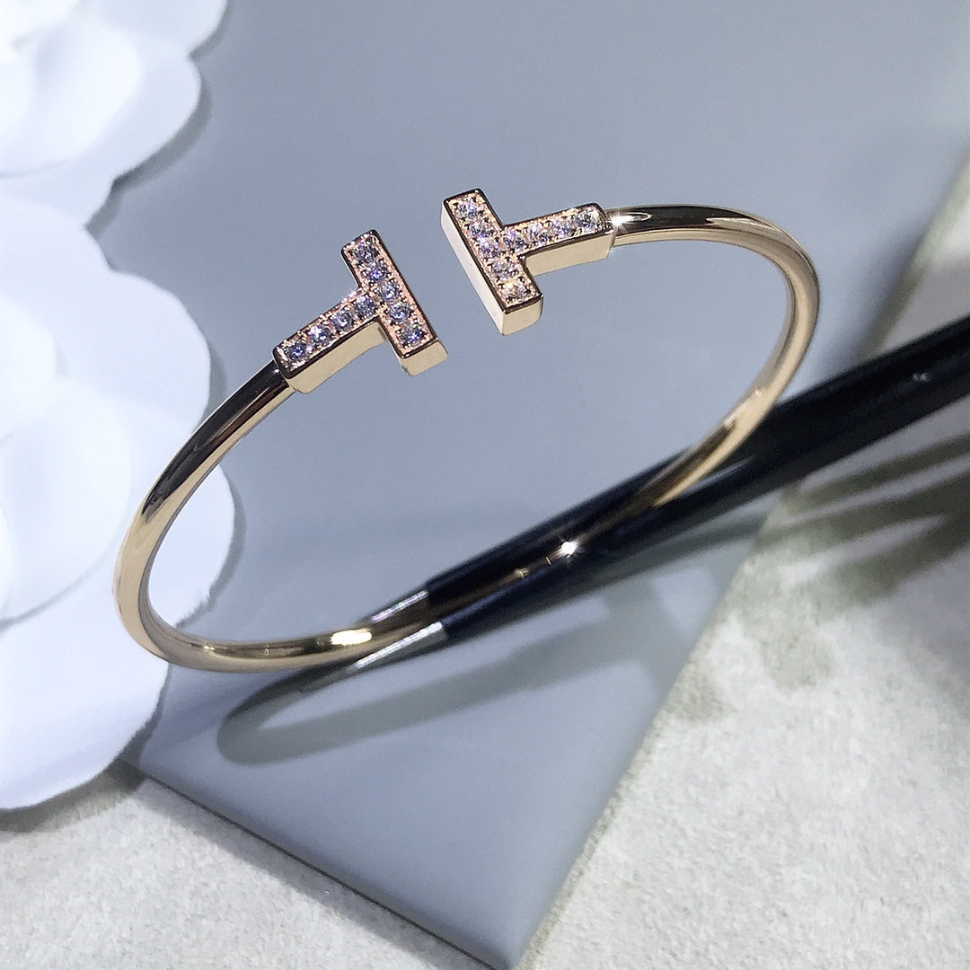{
  "Resenly Jewelry": "Resenly Jewelry",
  "T BRACELET PINK GOLD 1.8MM DIAMOND": "Tブレスレット ピンクゴールド 1.8MM ダイヤモンド"
}