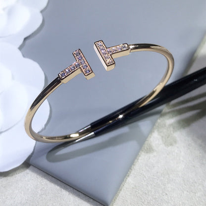 {
  "Resenly Jewelry": "Resenly Jewelry",
  "T BRACELET PINK GOLD 1.8MM DIAMOND": "Tブレスレット ピンクゴールド 1.8MM ダイヤモンド"
}