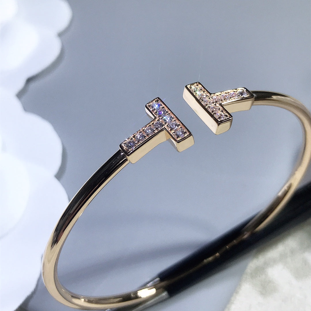 {
  "Resenly Jewelry": "Resenly Jewelry",
  "T BRACELET PINK GOLD 1.8MM DIAMOND": "Tブレスレット ピンクゴールド 1.8MM ダイヤモンド"
}