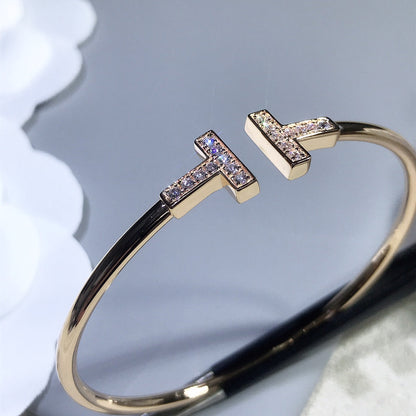 {
  "Resenly Jewelry": "Resenly Jewelry",
  "T BRACELET PINK GOLD 1.8MM DIAMOND": "Tブレスレット ピンクゴールド 1.8MM ダイヤモンド"
}