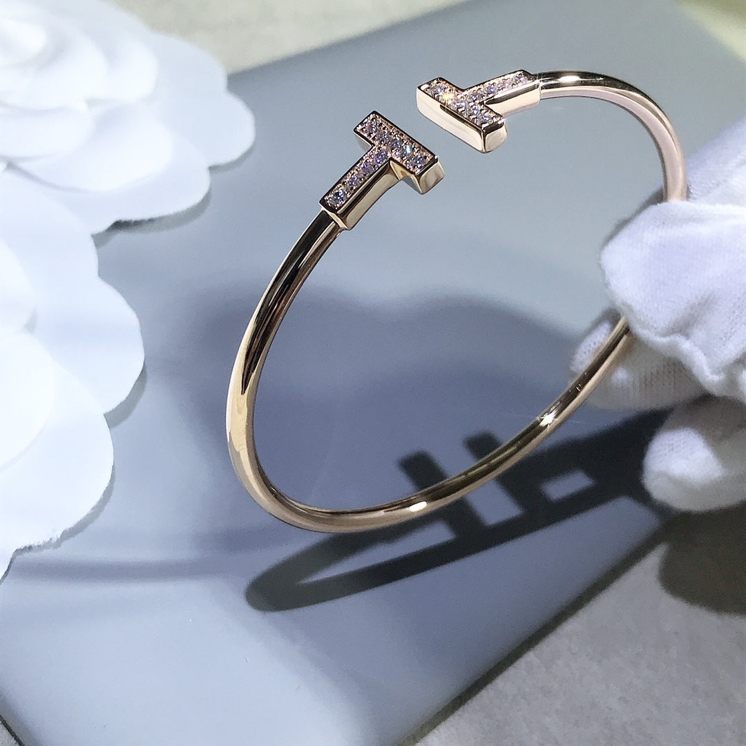 {
  "Resenly Jewelry": "Resenly Jewelry",
  "T BRACELET PINK GOLD 1.8MM DIAMOND": "Tブレスレット ピンクゴールド 1.8MM ダイヤモンド"
}
