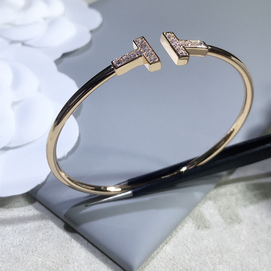 {
  "Resenly Jewelry": "Resenly Jewelry",
  "T BRACELET PINK GOLD 1.8MM DIAMOND": "Tブレスレット ピンクゴールド 1.8MM ダイヤモンド"
}