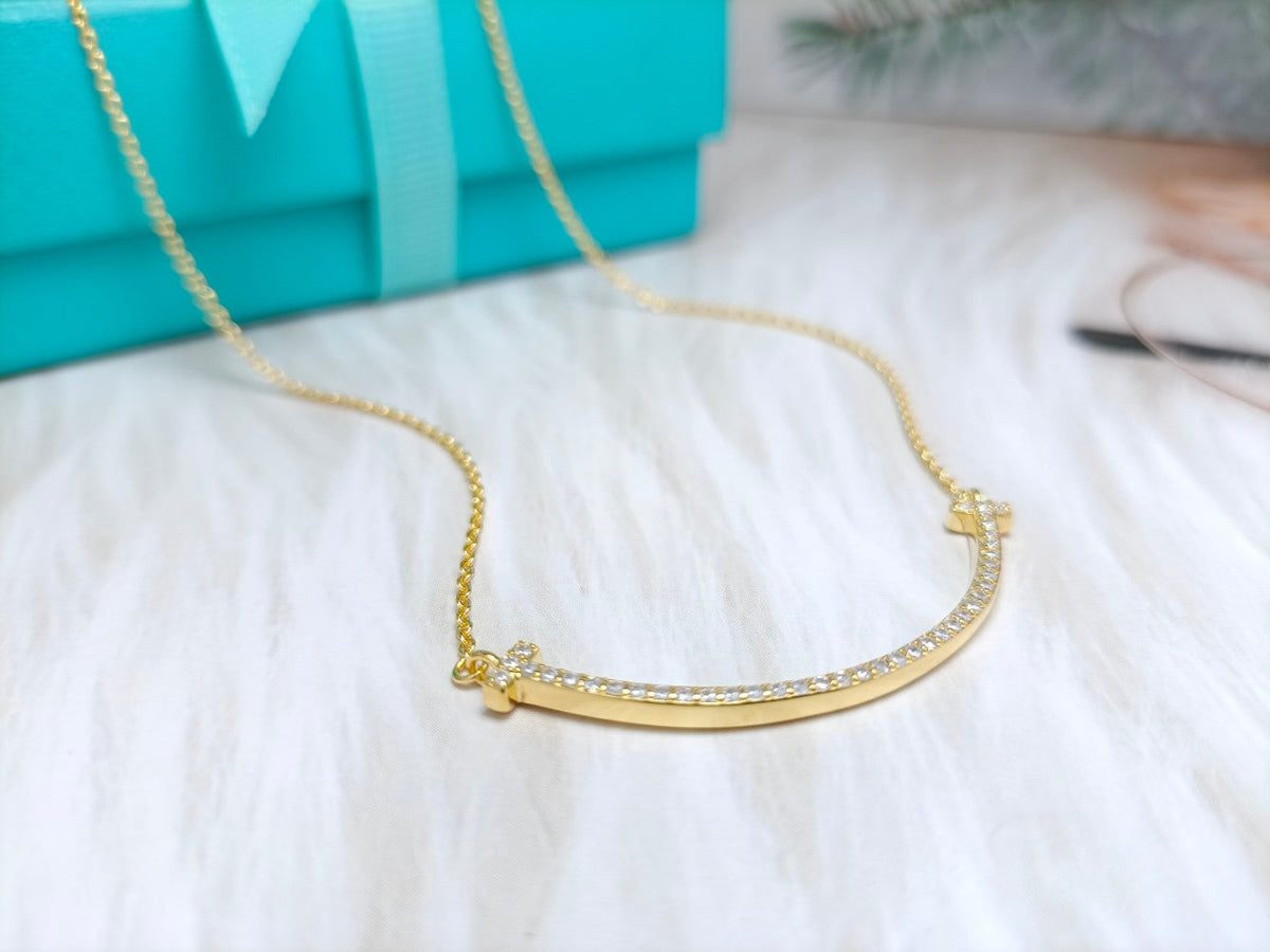 {
  "Resenly Jewelry": "Resenly Jewelry",
  "BIG SMILE PEDANT DIAMOND NECKLACE": "ビッグスマイル ペンダント ダイヤモンドネックレス"
}