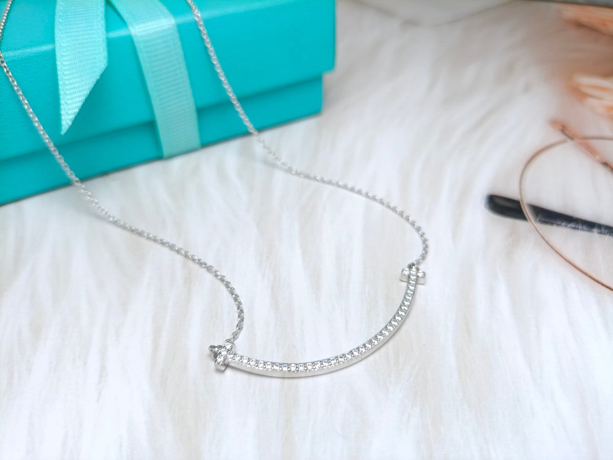{
  "Resenly Jewelry": "Resenly Jewelry",
  "BIG SMILE PEDANT DIAMOND NECKLACE": "ビッグスマイル ペンダント ダイヤモンドネックレス"
}