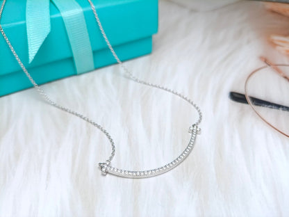 {
  "Resenly Jewelry": "Resenly Jewelry",
  "BIG SMILE PEDANT DIAMOND NECKLACE": "ビッグスマイル ペンダント ダイヤモンドネックレス"
}