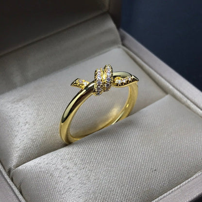 {
"Resenly Jewelry": "Resenly Jewelry",
"KNOT RING 1.2MM DIAMOND": "KNOT リング 1.2MM ダイヤモンド"
}