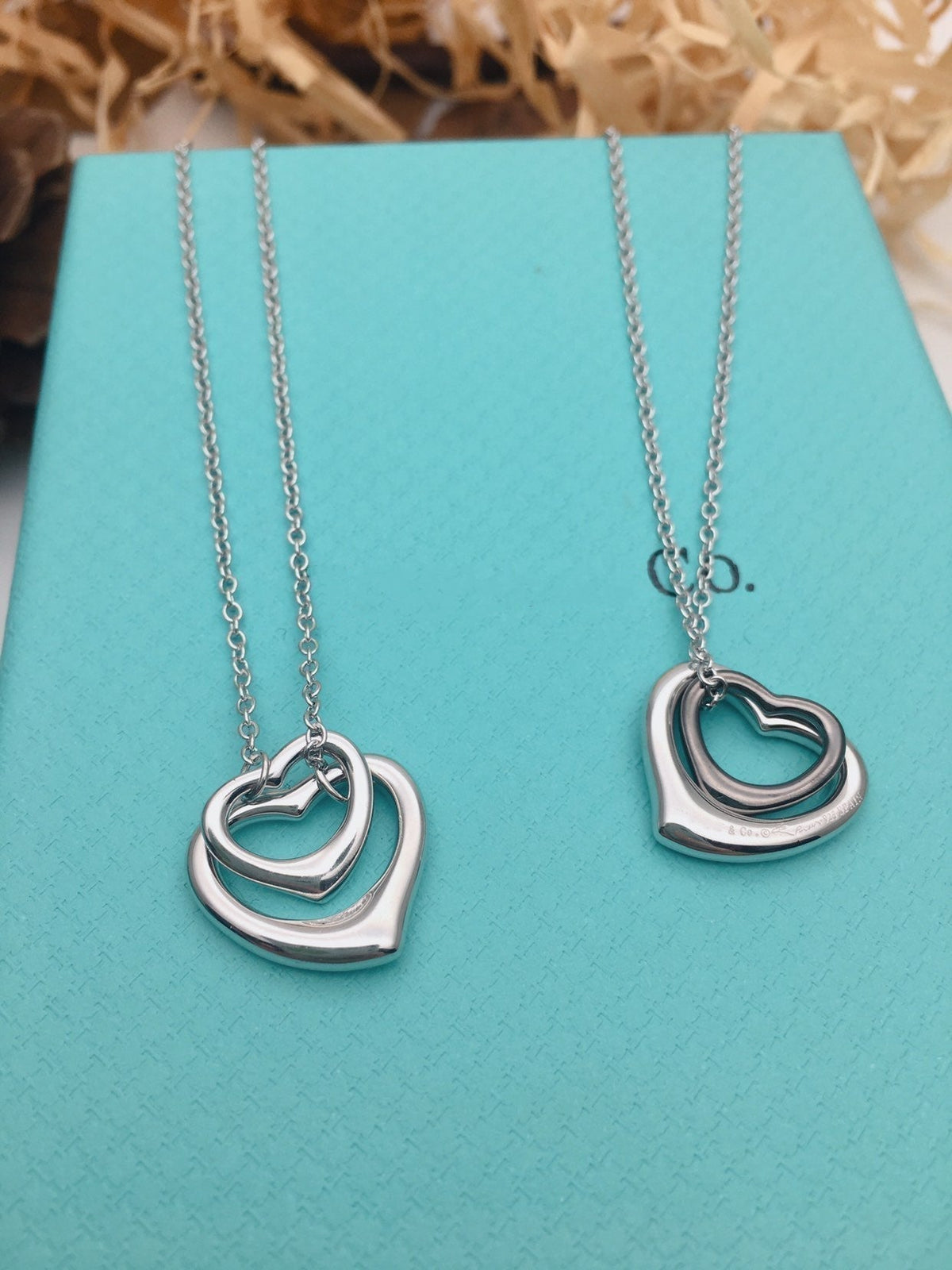 {
  "Resenly Jewelry": "Resenly Jewelry",
  "OPEN HEART SILVER NECKLACE": "オープンハート シルバーネックレス"
}