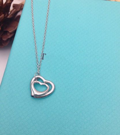 {
  "Resenly Jewelry": "Resenly Jewelry",
  "OPEN HEART SILVER NECKLACE": "オープンハート シルバーネックレス"
}
