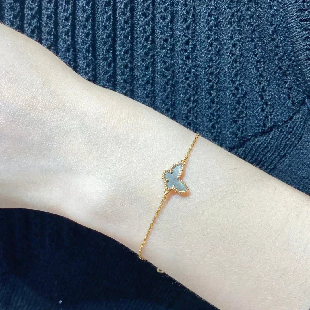 {
  "Resenly Jewelry": "Resenly Jewelry",
  "BUTTERFLY DARK MOP BUTTERFLY BRACELET": "バタフライ ダークMOP バタフライ ブレスレット"
}
