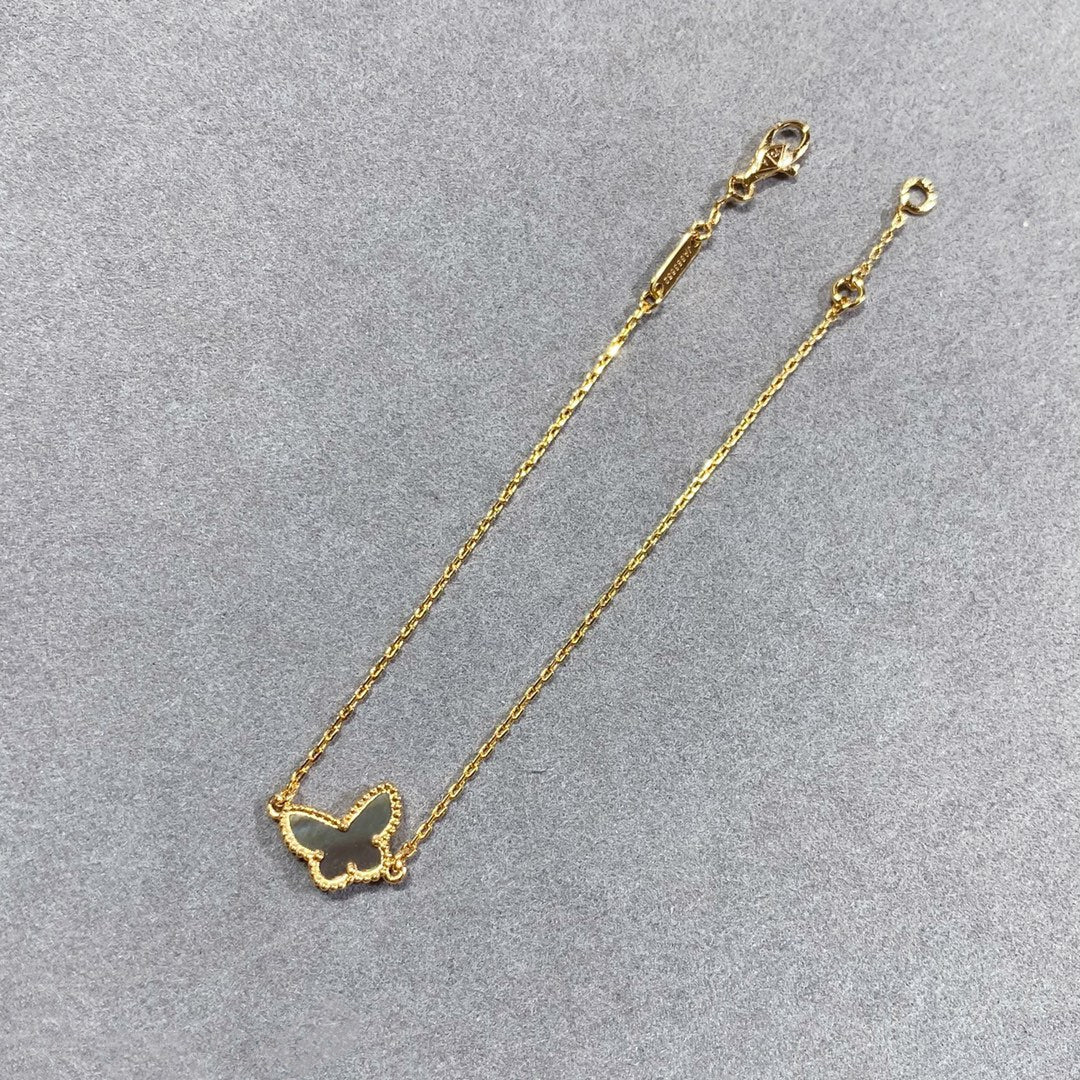 {
  "Resenly Jewelry": "Resenly Jewelry",
  "BUTTERFLY DARK MOP BUTTERFLY BRACELET": "バタフライ ダークMOP バタフライ ブレスレット"
}