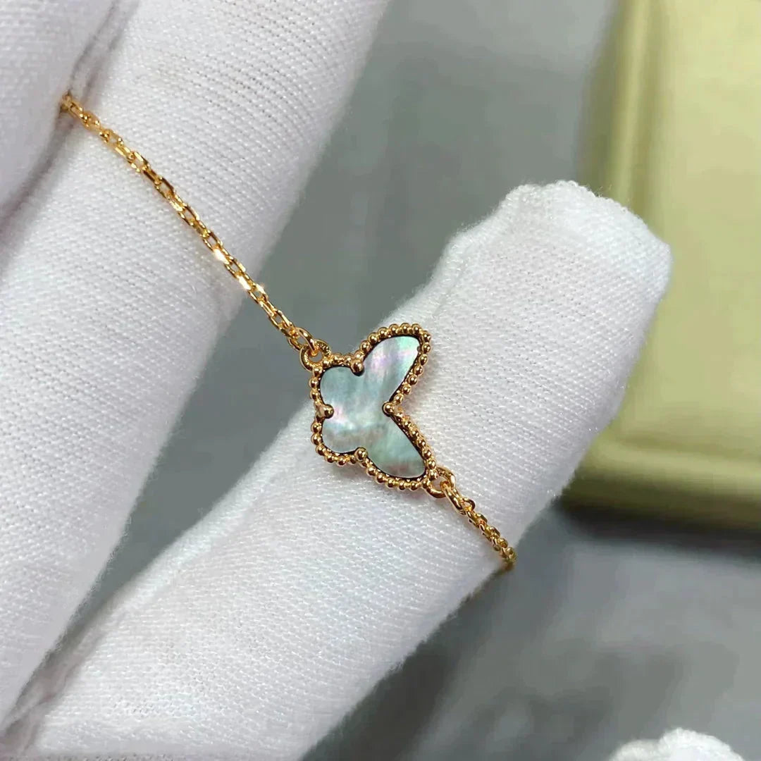 {
  "Resenly Jewelry": "Resenly Jewelry",
  "BUTTERFLY DARK MOP BUTTERFLY BRACELET": "バタフライ ダークMOP バタフライ ブレスレット"
}