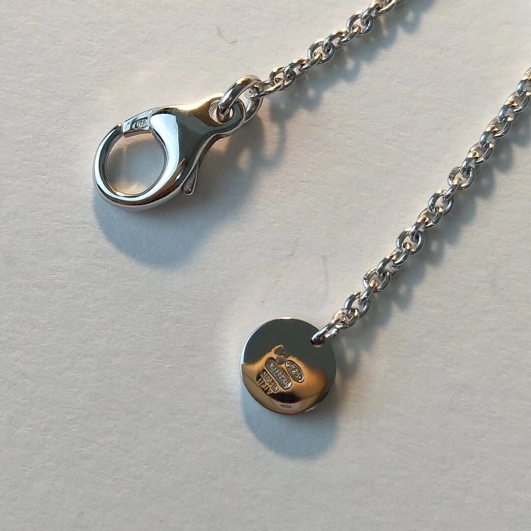 {
  "Resenly Jewelry": "リゼンリー・ジュエリー",
  "ZERO 1 BLACK CERAMIC SILVER NECKLACE": "ゼロワン ブラックセラミック シルバーネックレス"
}