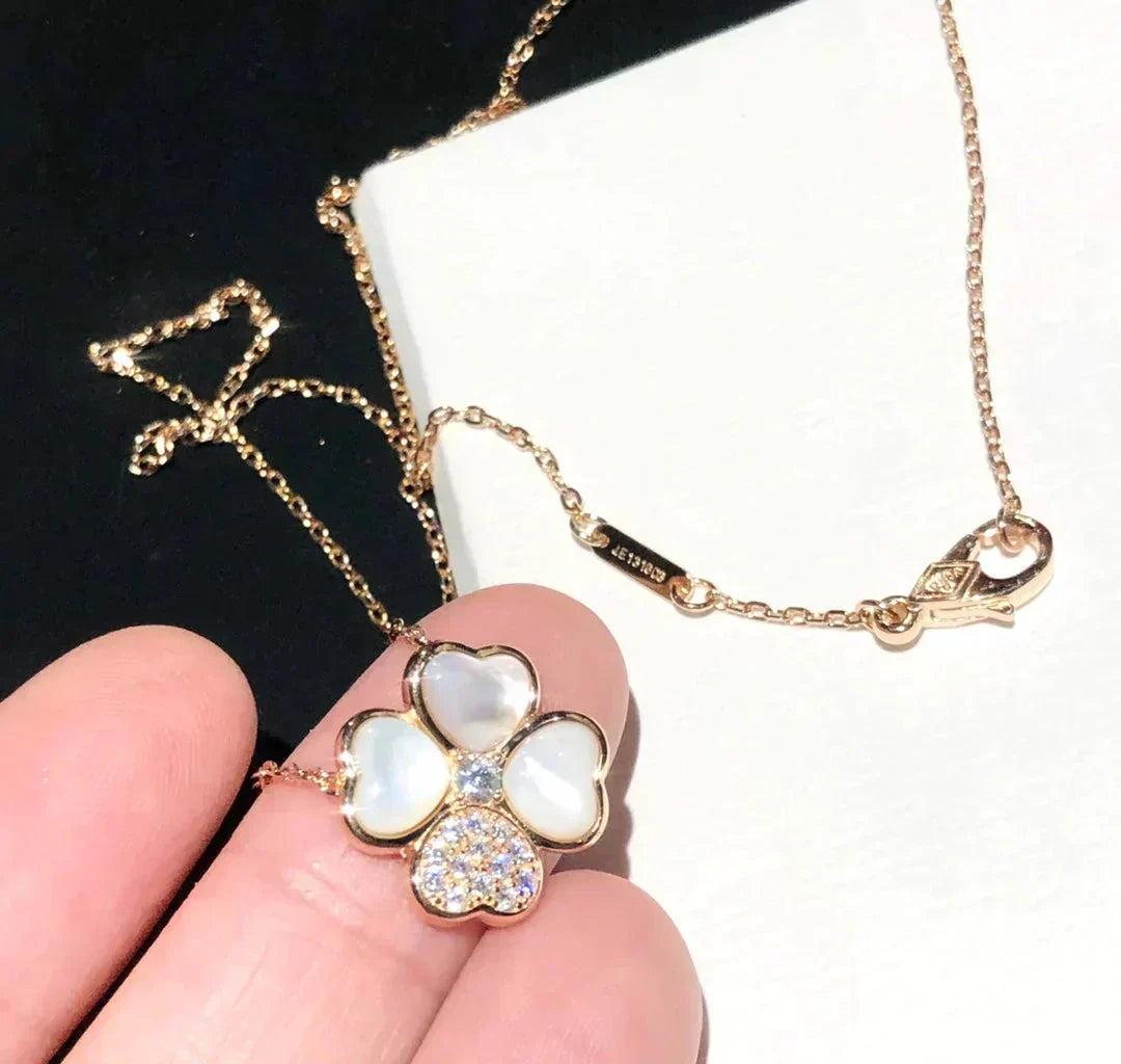 {
  "Resenly Jewelry": "Resenly Jewelry",
  "CLOVER MOP DIAMOND ROSE GOLD NECKLACE": "クローバー MOP ダイヤモンド ローズゴールド ネックレス"
}