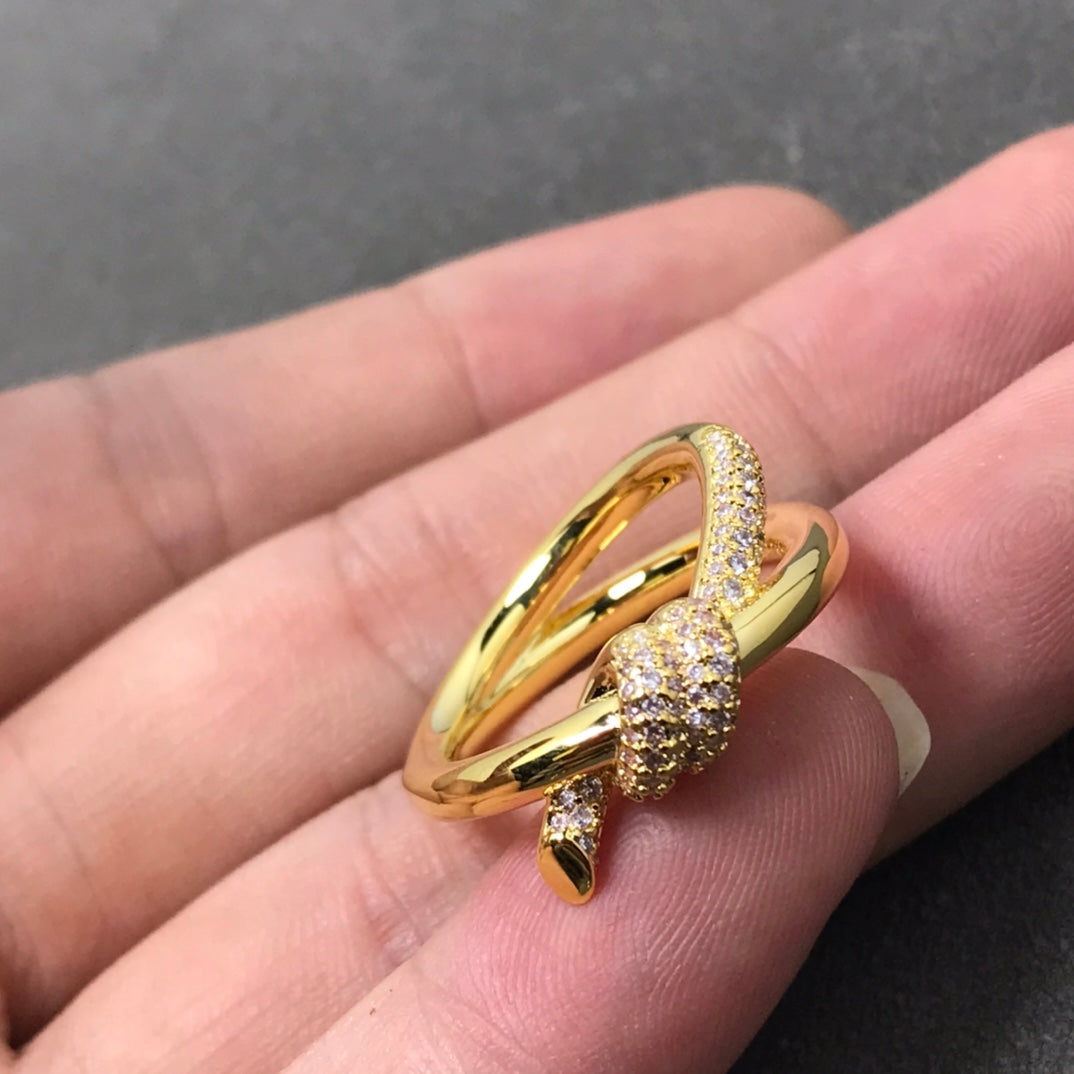 {
  "Resenly Jewelry": "Resenly Jewelry",
  "KNOT RING DOUBLE ROW DIAMOND": "ノットリング ダブルロウ ダイヤモンド"
}