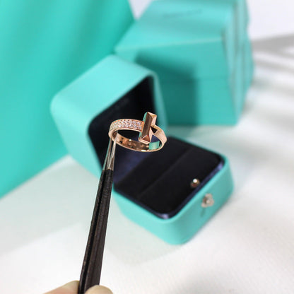 {
"Resenly Jewelry": "レゼンリー・ジュエリー",
"T1 NARROW DIAMOND PINK GOLD RING": "T1 ナロー ダイヤモンド ピンクゴールド リング"
}
