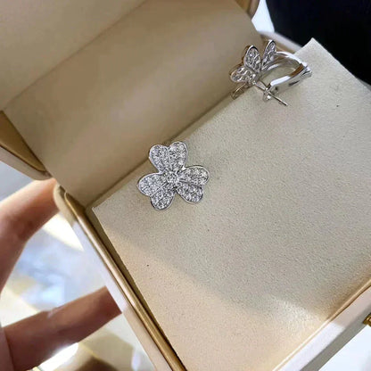 {
  "Resenly Jewelry": "Resenly Jewelry",
  "CLOVER COMOS DIAMOND EARRINGS SILVER": "クローバー コスモス ダイヤモンド ピアス シルバー"
}