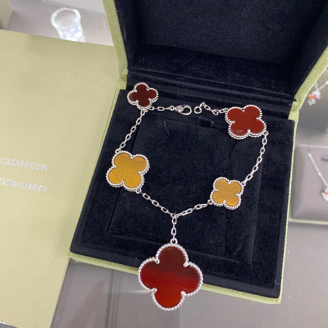 {
  "Resenly Jewelry": "Resenly Jewelry",
  "CLOVER 5 MOTIFS SIVLER CARNELIAN TIGER EYE BRACELET": "クローバー 5モチーフ シルバー カーネリアン タイガーアイ ブレスレット"
}