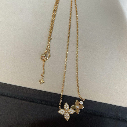 {
  "Resenly Jewelry": "レゼンリー・ジュエリー",
  "STAR BLOSSOM NECKLACE PINK GOLD DIAMONDS": "スター ブロッサム ネックレス ピンクゴールド ダイヤモンド"
}