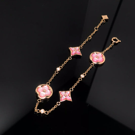 {
  "Resenly Jewelry": "レゼンリージュエリー",
  "STAR AND SUN 4 MOTIF PINK MOP PINK GOLD BRACELET": "スター＆サン 4モチーフ ピンクMOP ピンクゴールドブレスレット"
}