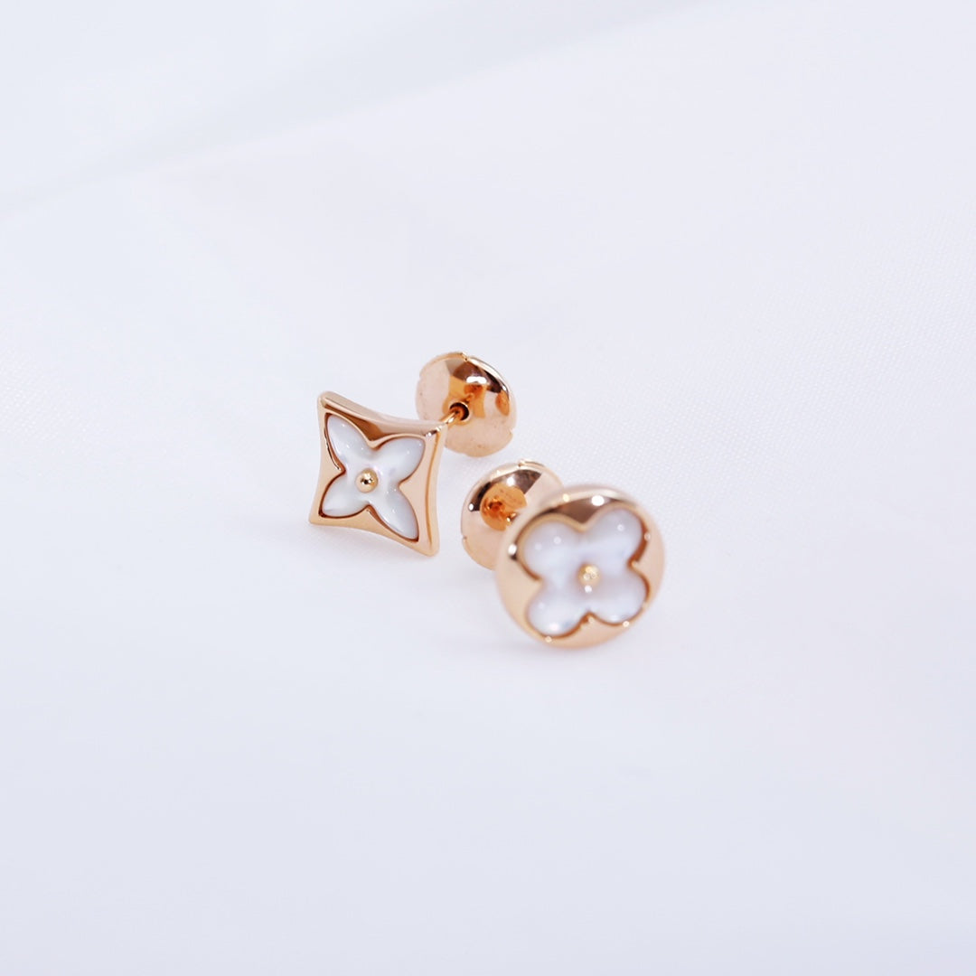 {
  "Resenly Jewelry": "Resenly Jewelry",
  "STAR AND SUN PINK GOLD MOP STUD EARRINGS": "スター＆サン ピンクゴールド MOP スタッドピアス"
}