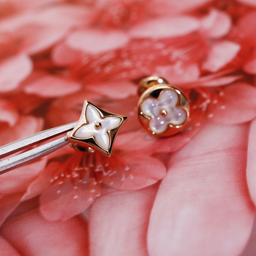 {
  "Resenly Jewelry": "Resenly Jewelry",
  "STAR AND SUN PINK GOLD MOP STUD EARRINGS": "スター＆サン ピンクゴールド MOP スタッドピアス"
}
