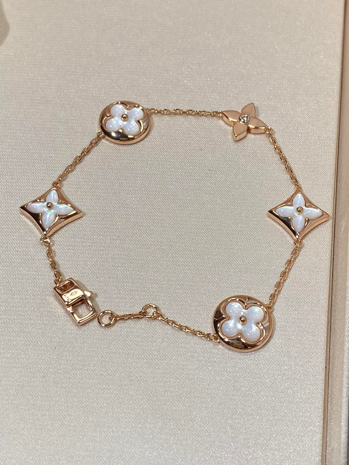 [Resenly Jewelry]STAR AND SUN 5 MOTIF MOP PINK GOLD BRACELET