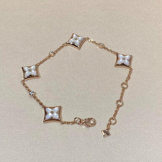 {
  "Resenly Jewelry": "Resenly Jewelry",
  "STAR 4 MOTIF MOP DIAMOND PINK GOLD BRACELET": "スター 4モチーフ マザーオブパール ダイヤモンド ピンクゴールド ブレスレット"
}