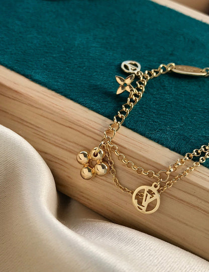 {
  "Resenly Jewelry": "Resenly Jewelry",
  "BLOOMING PINK GOLD MOP BRACELET": "ブルーミング ピンクゴールド MOP ブレスレット"
}