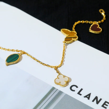 {
  "Resenly Jewelry": "レゼンリー・ジュエリー",
  "LUCKY SPRING 5 MOTIF GOLD BRACELET": "ラッキースプリング 5モチーフ ゴールドブレスレット"
}