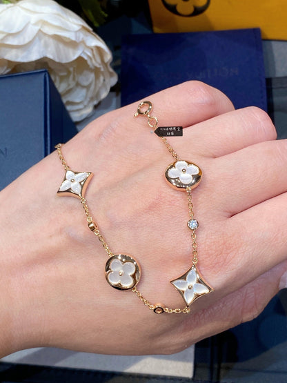 {
  "Resenly Jewelry": "Resenly Jewelry",
  "STAR AND SUN 4 MOTIF WHITE MOP PINK GOLD BRACELET": "スター＆サン 4モチーフ ホワイトMOP ピンクゴールドブレスレット"
}