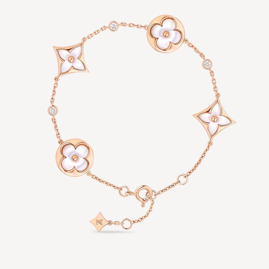 {
  "Resenly Jewelry": "Resenly Jewelry",
  "STAR AND SUN 4 MOTIF WHITE MOP PINK GOLD BRACELET": "スター＆サン 4モチーフ ホワイトMOP ピンクゴールドブレスレット"
}