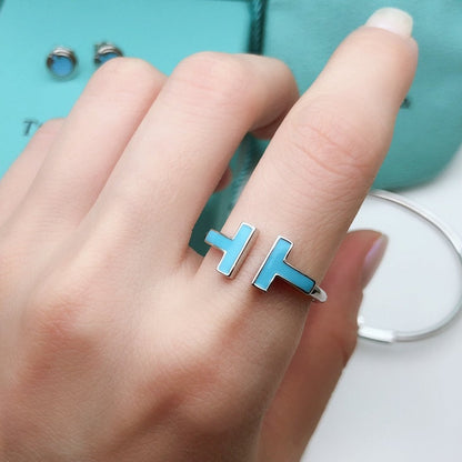 {
  "Resenly Jewelry": "Resenly Jewelry",
  "T SMALL TURQUOISE SILVER RING": "T スモール ターコイズ シルバーリング"
}