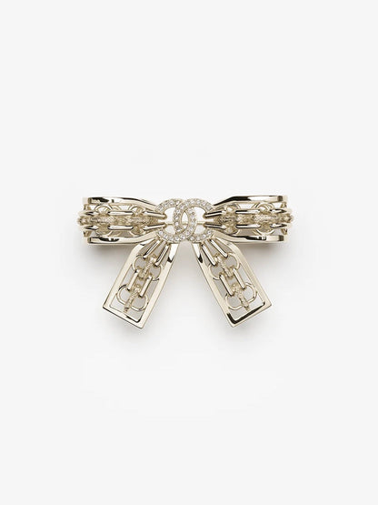 {
  "Resenly Jewelry": "Resenly Jewelry",
  "25K Hollow Bow Brooch": "25K 中空リボンブローチ"
}
