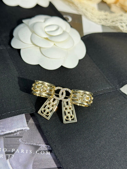 {
  "Resenly Jewelry": "Resenly Jewelry",
  "25K Hollow Bow Brooch": "25K 中空リボンブローチ"
}