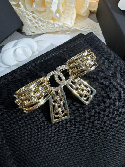 {
  "Resenly Jewelry": "Resenly Jewelry",
  "25K Hollow Bow Brooch": "25K 中空リボンブローチ"
}