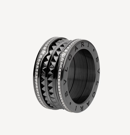 {
  "Resenly Jewelry": "レゼンリー・ジュエリー",
  "ZERO 1 ROCK FOUR-BAND BLACK CERAMIC WITH STUDDED SPIRAL AND PAVED DIAMONDS RING": "ビー・ゼロワン ロック 4バンド ブラックセラミック スタッズスパイラル パヴェダイヤモンド リング"
}