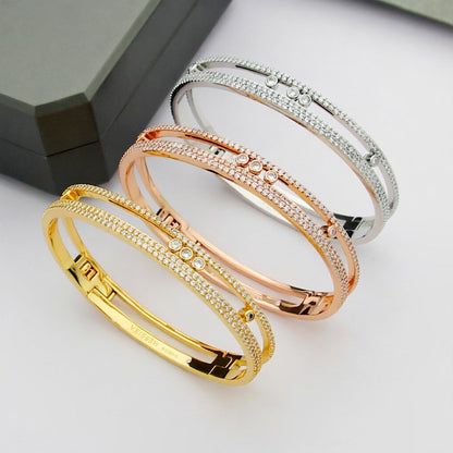 {
  "Resenly Jewelry": "レゼンリー・ジュエリー",
  "Move Romane pavé bangle": "ムーヴ ロマーヌ パヴェ バングル"
}