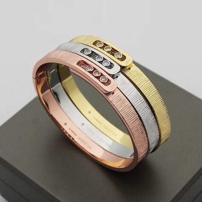 {
  "Resenly Jewelry": "レセンリー・ジュエリー",
  "Move Noa Ciselé bangle": "ムーヴ ノア シズレ バングル"
}