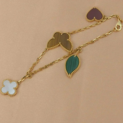 {
  "Resenly Jewelry": "レゼンリー・ジュエリー",
  "LUCKY SPRING 5 MOTIF GOLD BRACELET": "ラッキースプリング 5モチーフ ゴールドブレスレット"
}