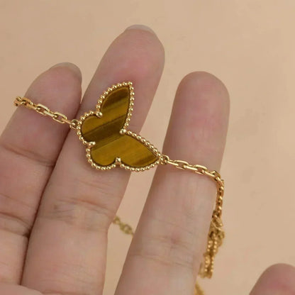 {
  "Resenly Jewelry": "レゼンリー・ジュエリー",
  "LUCKY SPRING 5 MOTIF GOLD BRACELET": "ラッキースプリング 5モチーフ ゴールドブレスレット"
}