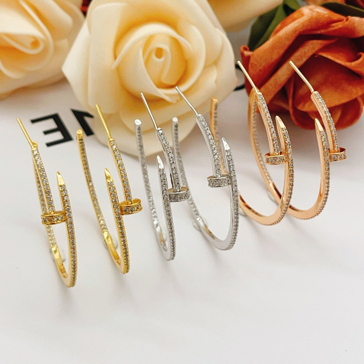 {
  "Resenly Jewelry": "Resenly Jewelry",
  "JUSTE FULL DIAMOND LARGE EARRINGS": "JUSTE フルダイヤモンド ラージイヤリング"
}