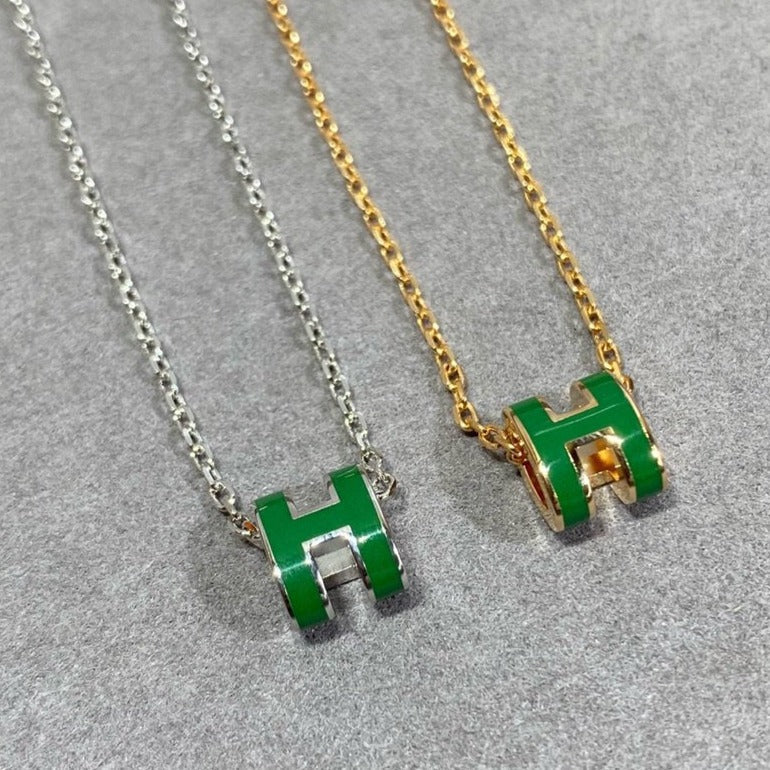 {
  "Resenly Jewelry": "Resenly Jewelry",
  "POP H GREEN NECKLACE SILVER AND GOLD": "POP H グリーンネックレス シルバー＆ゴールド"
}
