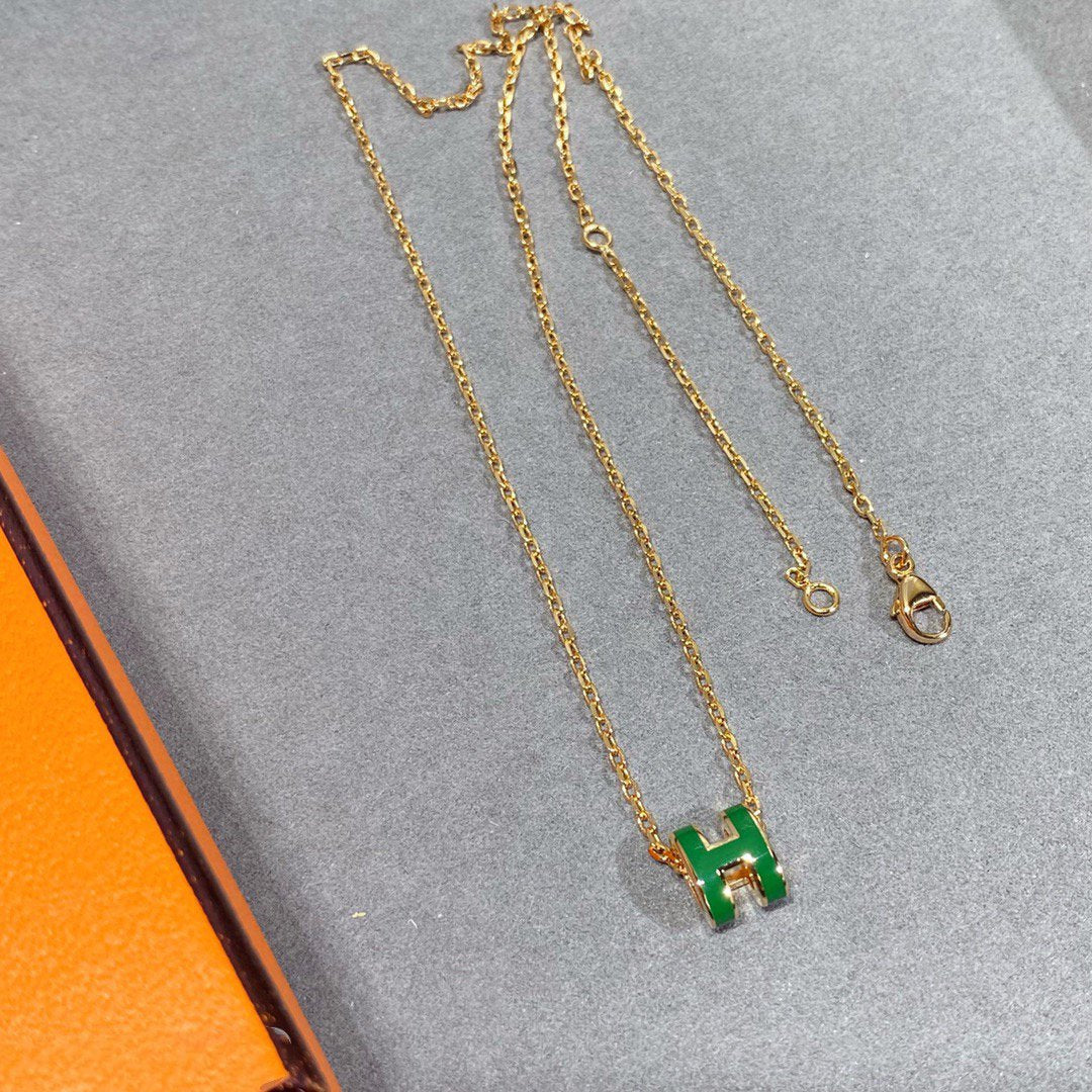 {
  "Resenly Jewelry": "Resenly Jewelry",
  "POP H GREEN NECKLACE SILVER AND GOLD": "POP H グリーンネックレス シルバー＆ゴールド"
}